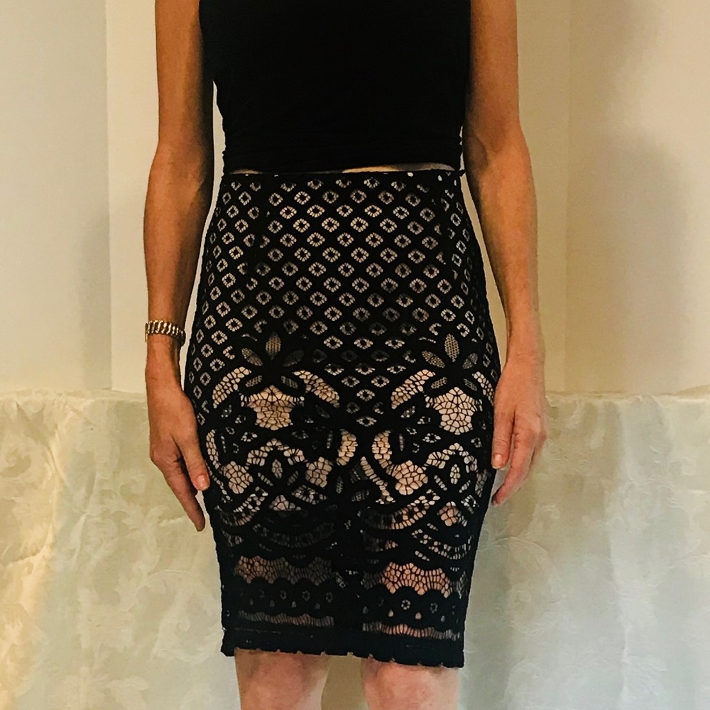 Black lace over nude slip